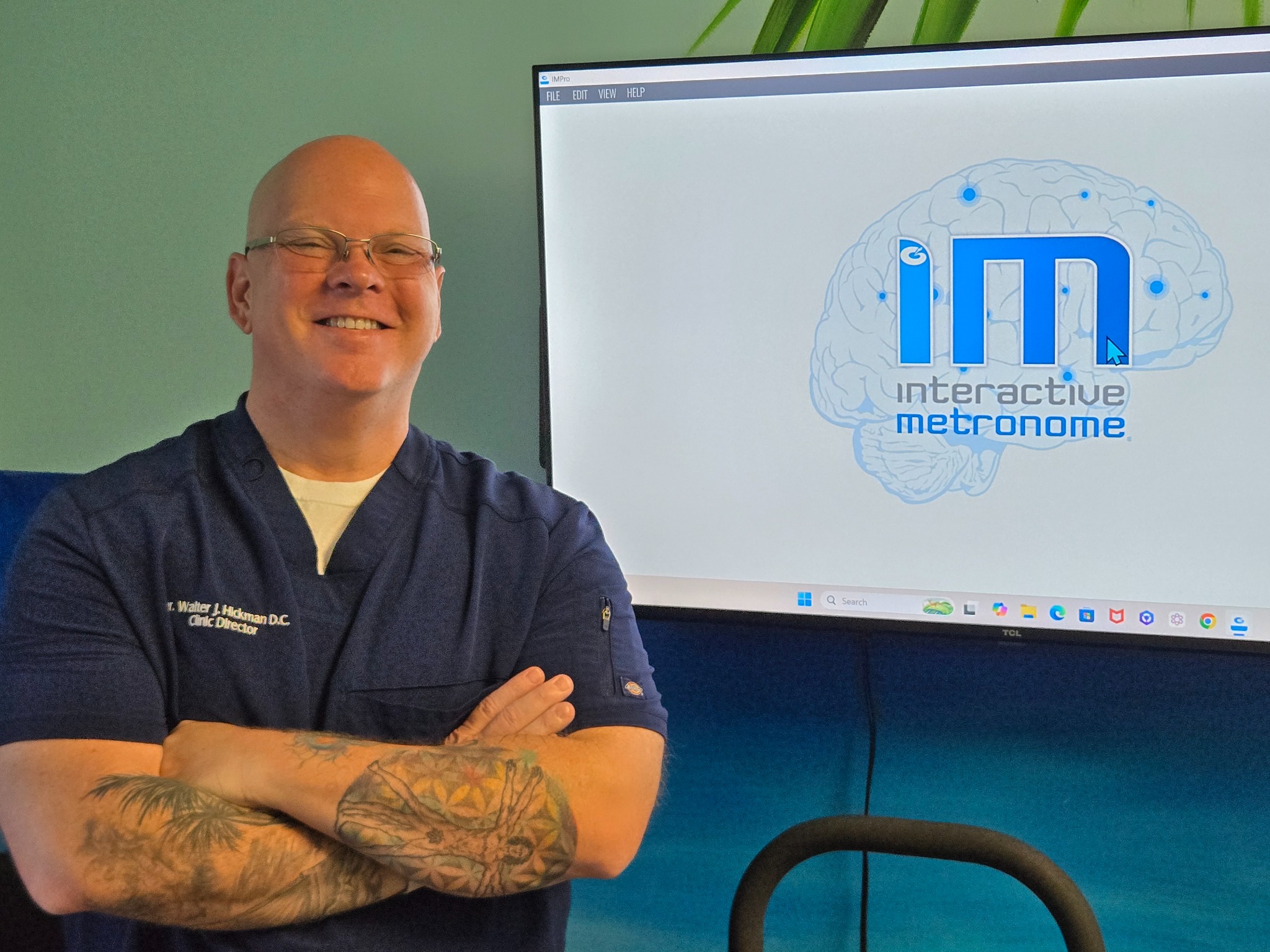 Dr. Hickman with the Interactive Metronome system